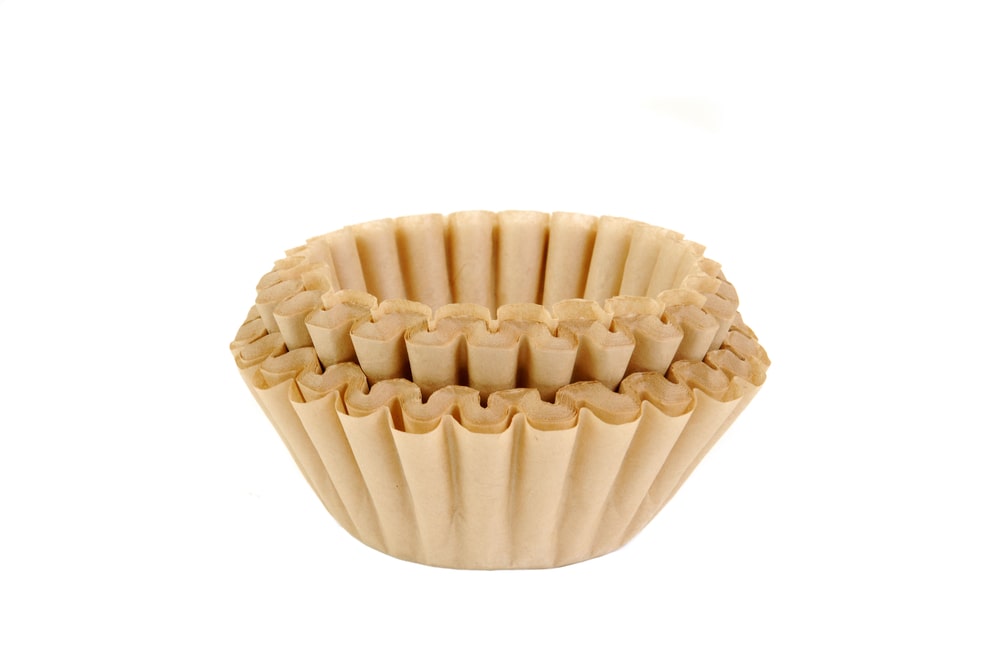 stack-unbleached-coffee-filters-on-white