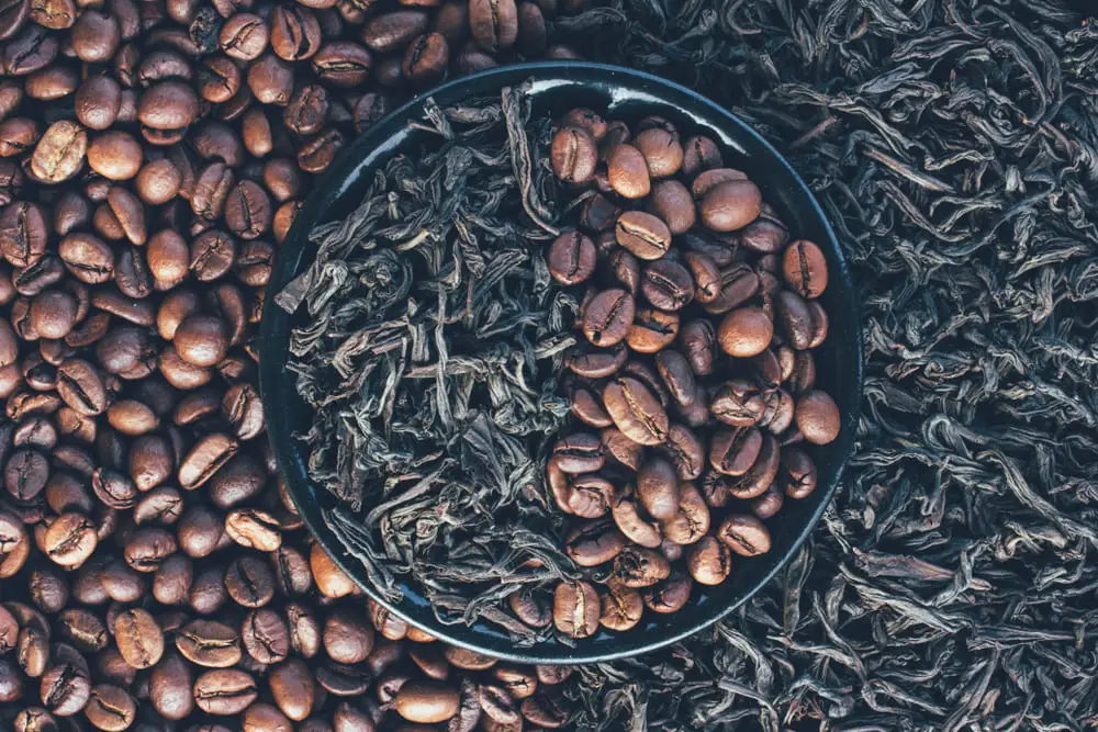 roasted-coffee-beans-dry-leaves-black